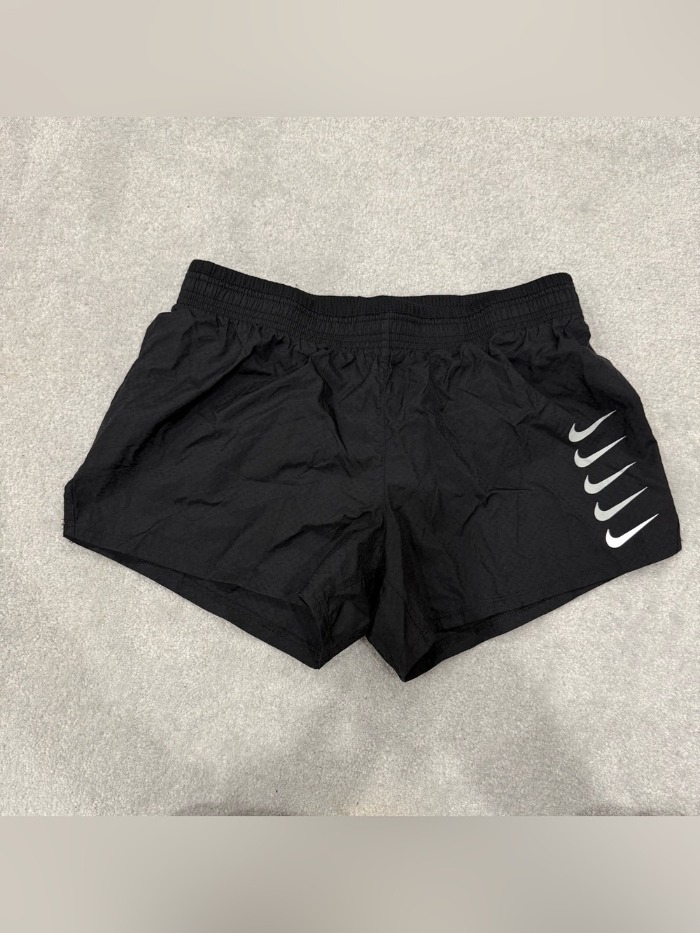 Nike Black Shorts with White Swoosh Logo